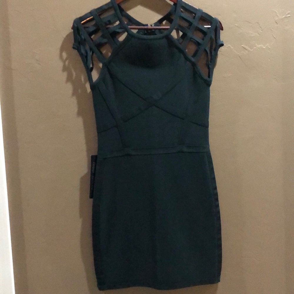 Green Bebe body con dress size M